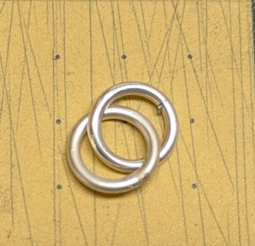 Judy Larson's Double Link Chain - , Chain Maille Jewelry, Making Chain, Chain Making , Butane Torch, Soldering, Solder, Chain Maille, chain mail, chainmaille, chainmail, , Add the next ring to the soldered ring.